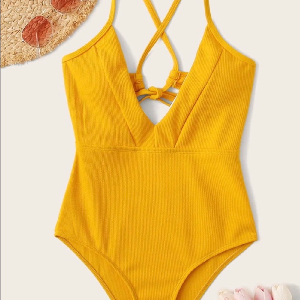 Yellow tie back one piece.
